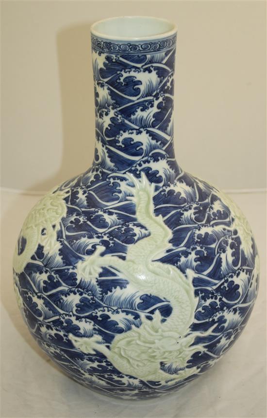 A Chinese blue and white dragon vase, 34cm